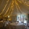 A marquee, decorated for a wedding.