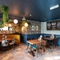 interior of the pub with dining tables and chairs