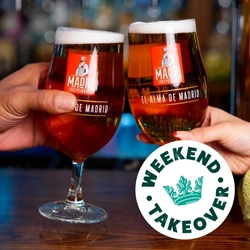 A banner of two pints of Madri in a cheers position with a 'Weekend takeover' logo for Greene King Pubs.