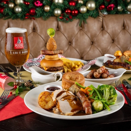 An interior shot of a selection of main dishes served for Christmas at Flaming Grill venues.