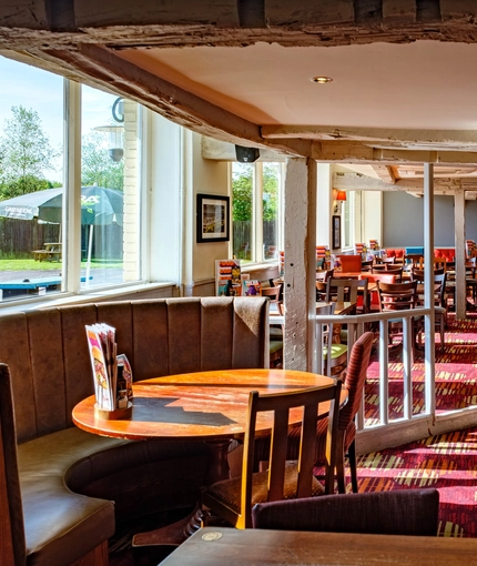 Interior dining area of a pub.