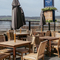 The beer garden near a waterfront outside the Ardencaple Hotel.