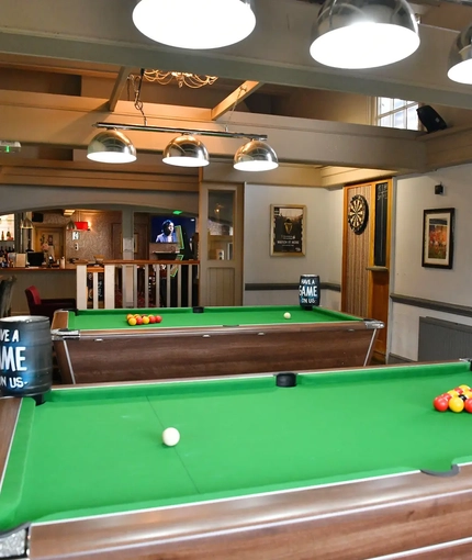 interior of the pub with pool tables