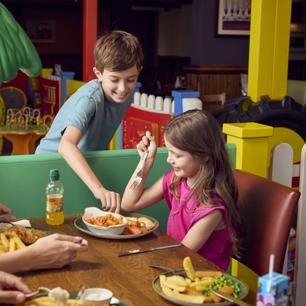 A family enjoying a meal at Farmhouse Inns