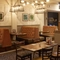 The interior restaurant seating area at The Caledonian Hotel.