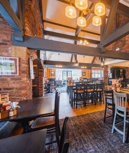 The bar and interior restaurant seating area at The Belfry in Beighton.