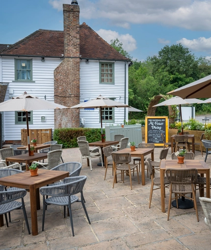 The exterior beer garden and seating area at the Vauxhall Inn.