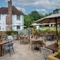 The exterior beer garden and seating area at the Vauxhall Inn.