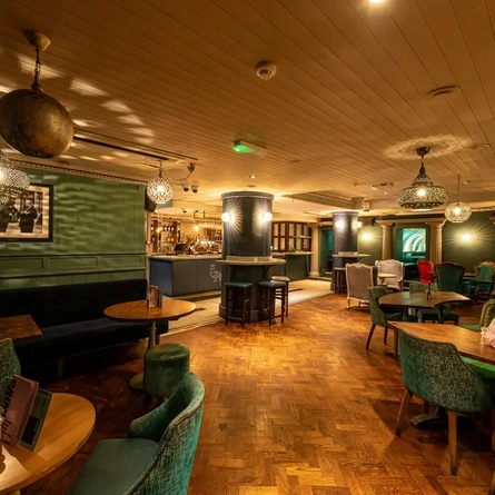 Some tables in the restaurant of the Finery.