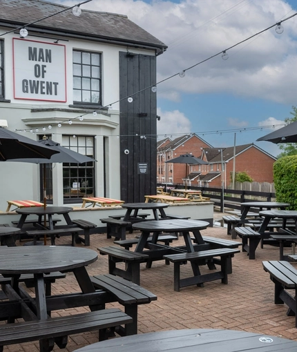 The exterior beer garden and seating area at the Man of Gwent.