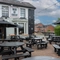 The exterior beer garden and seating area at the Man of Gwent.