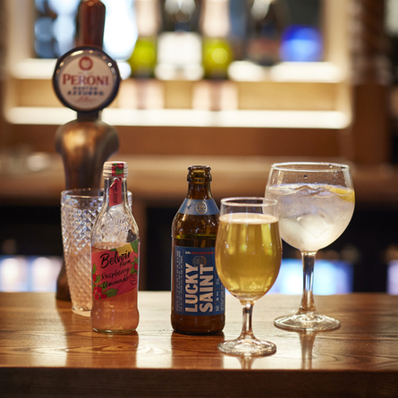 A selection of low and no alcohol drinks on a bar.