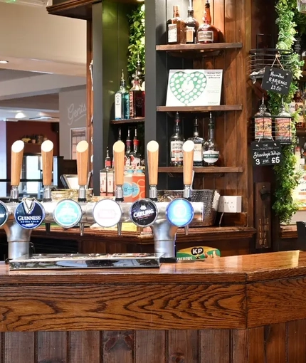 The interior bar with bar stool seating at The Quays.