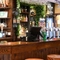 The interior bar with bar stool seating at The Quays.