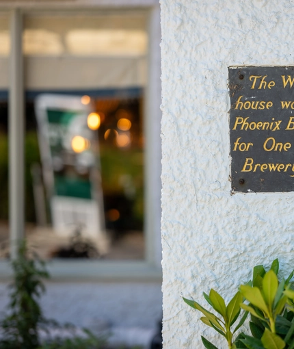 A plaque on the wall of the Wateringbury.
