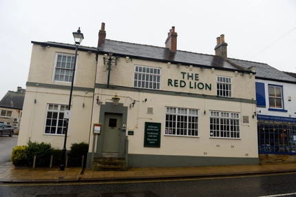 The exterior facade of the Red Lion.