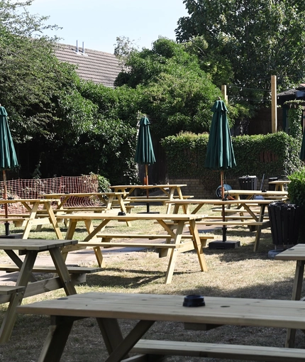 The exterior beer garden seating area with the venue in the background at The Yorkshire Grey.