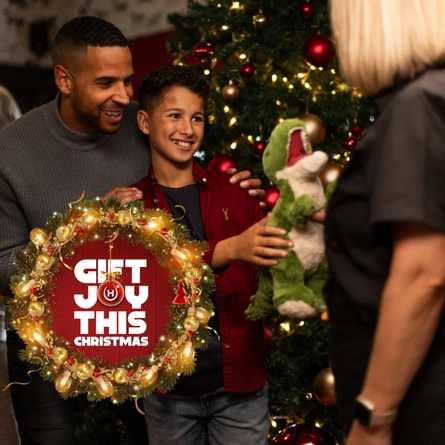 A Christmas graphic banner 'Gift joy this Christmas' for Hungry Horse venues.