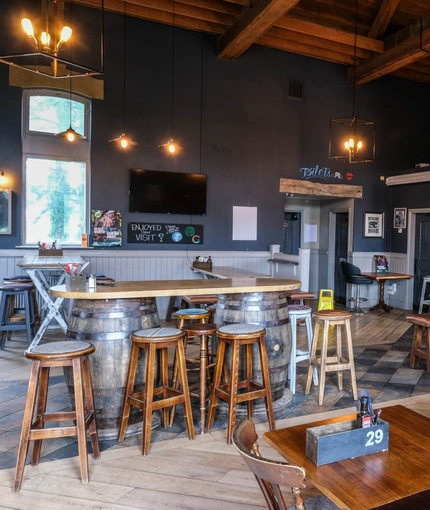 interior of the restaurant with a bar