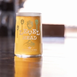 An interior shot of a Level Head pint served at a Brewery for Greene King Pubs.