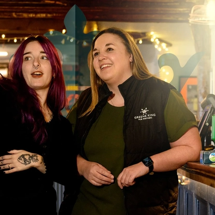 2 members of staff in a Hive venue.
