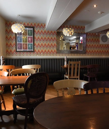 Interior dining area of a pub.