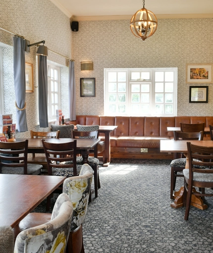 Interior dining area of a pub.