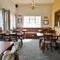 Interior dining area of a pub.