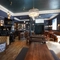 The interior seating area with TV and pub games, at Shakespeares in Edinburgh.