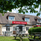 The exterior facade, beer garden seating area at the Sussex Yeoman.