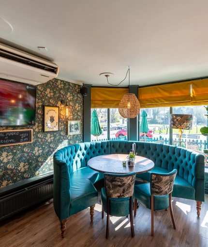 Interior seating and restaurant area of the Buff