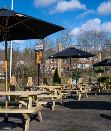 The exterior beer garden with seating area at the Lutley Oak.