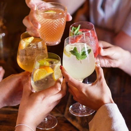 An interior shot of people enjoying summer drinks at Urban Core & Heritage venues.