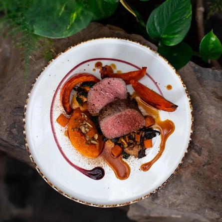 An interior shot of food served in the restaurant/seating area at the Ubiquitous Chip in Glasgow.