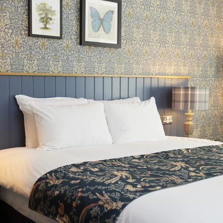 A bedroom at The Rose Revived hotel