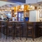 Interior bar of a pub with a seating area.