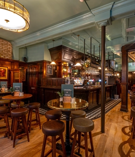 The interior restaurant and seating with bar area at the Two Brewers.