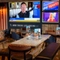 The interior restaurant and seating area with TV on the wall at the Man of Gwent.