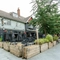 External view of a pub and beer garden