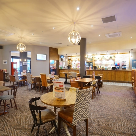 The interior restaurant seating area and bar at The Seahorse.