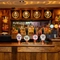 The interior bar focusing on a pump with several pump clips including Abbot, Old Speckled Hen, Old Golden Hen and Timothy Taylors Landlord all served at the Apple Tree.