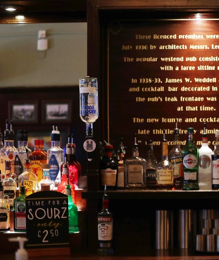 Spirits bottles behind the bar