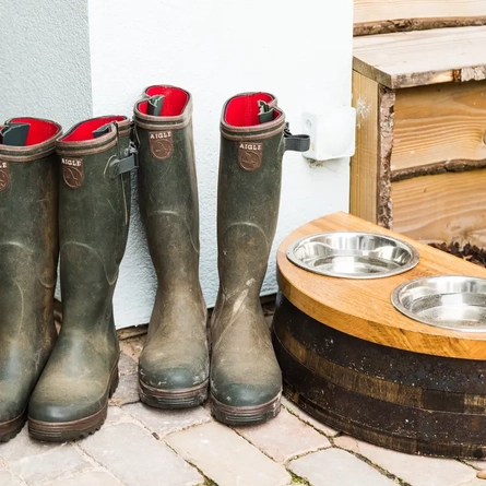 A pair of muddy boots