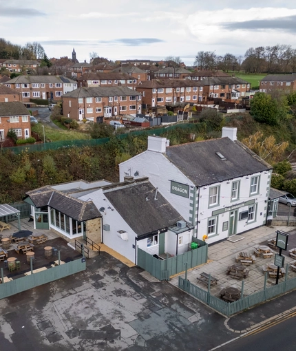 The exterior facade, beer garden and seating area at the Dragon.