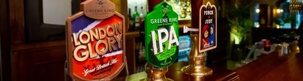 Bar with beers on tap being displayed