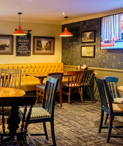 Interior dining area of a pub.