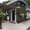Exterior beer garden of a pub with a seating area.