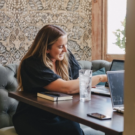 a woman sitting in a restaurant