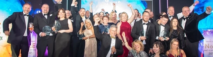 A group photo of Pub Partners staff winning a award.