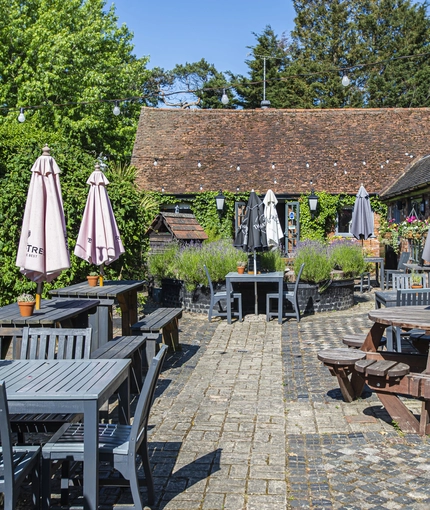 A beer garden outside of a pub